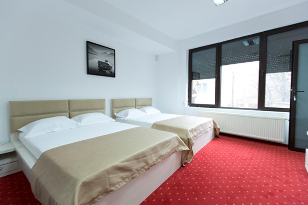 بوخارست Hotel Thomas الغرفة الصورة